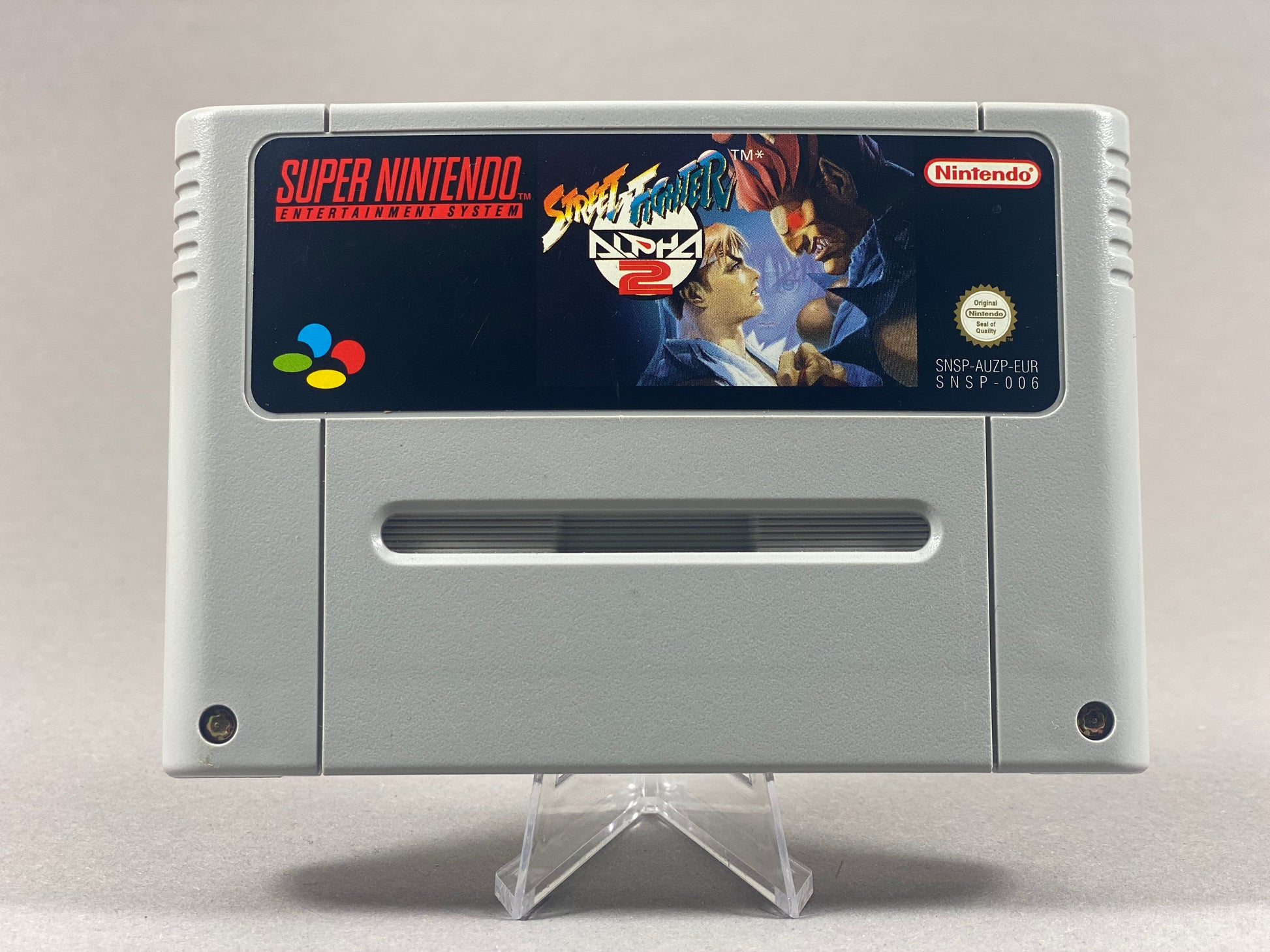 Super Nintendo Videospiel Street Fighter Alpha 2 Modul von vorne